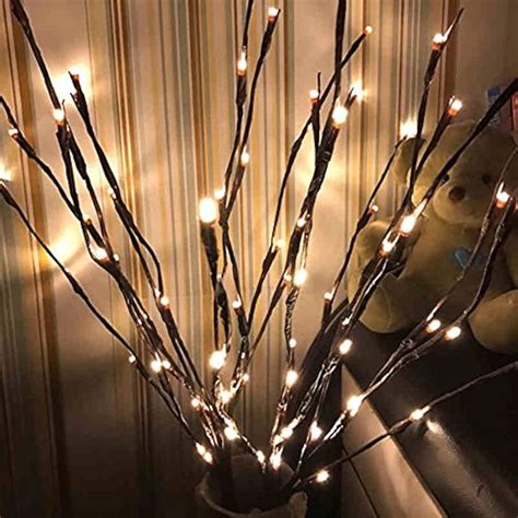 lighted tree branches|lighted decorative branches.